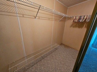 This one-owner 2-bedroom 2 bath home has 1240 square feet and is on Big Cypress Golf and Country Club in Florida - for sale on GolfHomes.com, golf home, golf lot