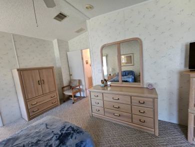 This one-owner 2-bedroom 2 bath home has 1240 square feet and is on Big Cypress Golf and Country Club in Florida - for sale on GolfHomes.com, golf home, golf lot