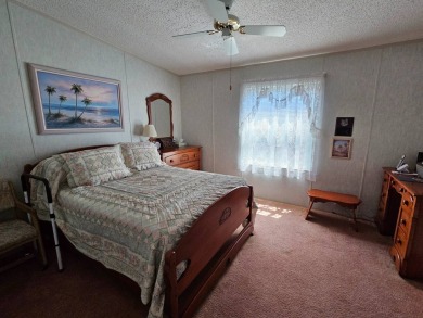 This one-owner 2-bedroom 2 bath home has 1240 square feet and is on Big Cypress Golf and Country Club in Florida - for sale on GolfHomes.com, golf home, golf lot