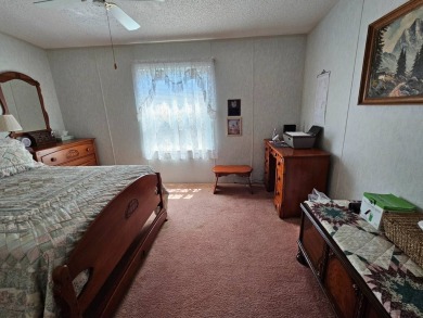 This one-owner 2-bedroom 2 bath home has 1240 square feet and is on Big Cypress Golf and Country Club in Florida - for sale on GolfHomes.com, golf home, golf lot