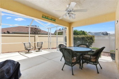 GREAT OUTDOOR SPACE! Step through the leaded glass entry of this on The Links of Spruce Creek in Florida - for sale on GolfHomes.com, golf home, golf lot