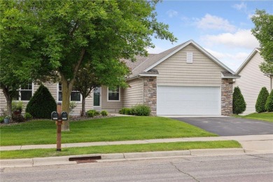 Enjoy one-level living in this end-unit townhome situated on a on Golf at the Legacy in Minnesota - for sale on GolfHomes.com, golf home, golf lot