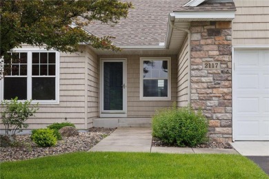 Enjoy one-level living in this end-unit townhome situated on a on Golf at the Legacy in Minnesota - for sale on GolfHomes.com, golf home, golf lot