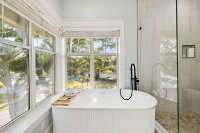 This beautifully renovated end-unit townhome, complete with a on Sandestin Golf and Beach Resort - Raven in Florida - for sale on GolfHomes.com, golf home, golf lot