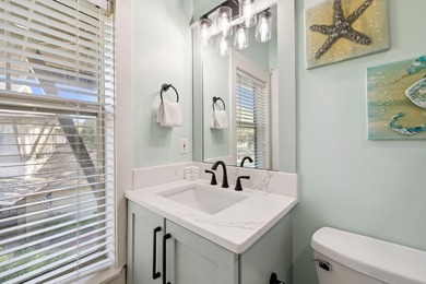 This beautifully renovated end-unit townhome, complete with a on Sandestin Golf and Beach Resort - Raven in Florida - for sale on GolfHomes.com, golf home, golf lot