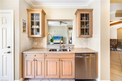 Soak up postcard-worthy southern exposure from this first-floor on The Colony Golf and Country Club in Florida - for sale on GolfHomes.com, golf home, golf lot