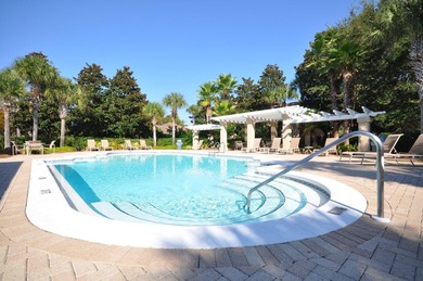 This beautifully renovated end-unit townhome, complete with a on Sandestin Golf and Beach Resort - Raven in Florida - for sale on GolfHomes.com, golf home, golf lot