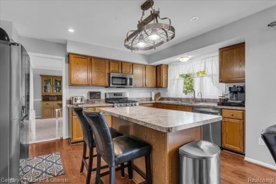 Welcome to 100 Mornington Ct. A beautifully updated brick on Pheasant Run Golf Club in Michigan - for sale on GolfHomes.com, golf home, golf lot