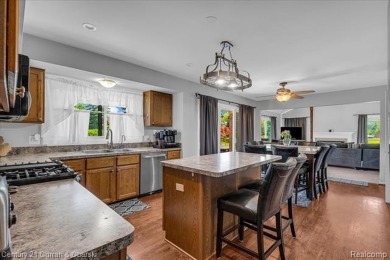 Welcome to 100 Mornington Ct. A beautifully updated brick on Pheasant Run Golf Club in Michigan - for sale on GolfHomes.com, golf home, golf lot
