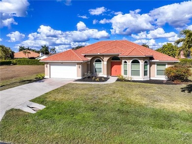 Experience refined Florida living in this beautifully maintained on Spanish Wells Golf and Country Club in Florida - for sale on GolfHomes.com, golf home, golf lot