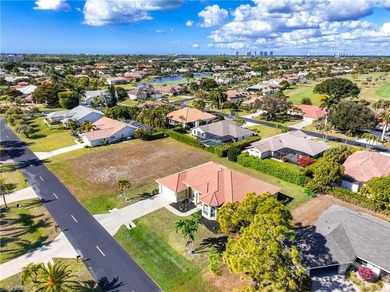 Experience refined Florida living in this beautifully maintained on Spanish Wells Golf and Country Club in Florida - for sale on GolfHomes.com, golf home, golf lot