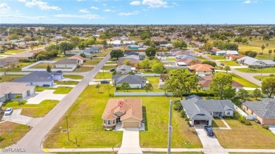Welcome to your dream home in Cape Coral! This beautifully on El Rio Golf Course and Club in Florida - for sale on GolfHomes.com, golf home, golf lot