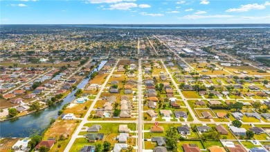 Welcome to your dream home in Cape Coral! This beautifully on El Rio Golf Course and Club in Florida - for sale on GolfHomes.com, golf home, golf lot