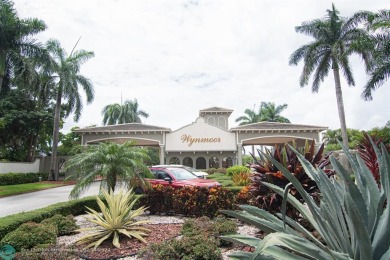 Step into the epitome of serene living with this delightful on Wynmoor Golf Course in Florida - for sale on GolfHomes.com, golf home, golf lot