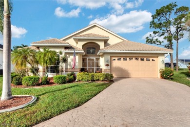 This well maintained lake view home is ideally located tucked in on Sabal Springs Golf and Racquet Club in Florida - for sale on GolfHomes.com, golf home, golf lot
