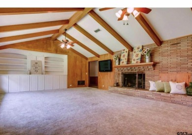 Welcome to this beautifully crafted ranch-style residence that on Mount Pleasant Country Club in Texas - for sale on GolfHomes.com, golf home, golf lot