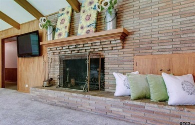 Welcome to this beautifully crafted ranch-style residence that on Mount Pleasant Country Club in Texas - for sale on GolfHomes.com, golf home, golf lot