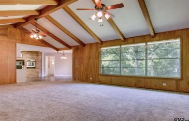 Welcome to this beautifully crafted ranch-style residence that on Mount Pleasant Country Club in Texas - for sale on GolfHomes.com, golf home, golf lot