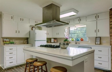 Welcome to this beautifully crafted ranch-style residence that on Mount Pleasant Country Club in Texas - for sale on GolfHomes.com, golf home, golf lot