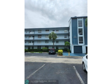 Beautiful Corner unit, nicely updated with direct golf course on  in Florida - for sale on GolfHomes.com, golf home, golf lot