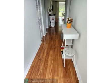 Beautiful Corner unit, nicely updated with direct golf course on  in Florida - for sale on GolfHomes.com, golf home, golf lot