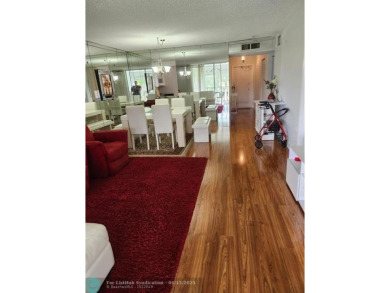 Beautiful Corner unit, nicely updated with direct golf course on  in Florida - for sale on GolfHomes.com, golf home, golf lot