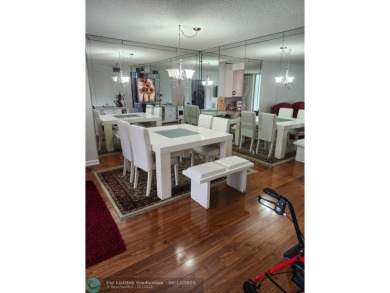 Beautiful Corner unit, nicely updated with direct golf course on  in Florida - for sale on GolfHomes.com, golf home, golf lot