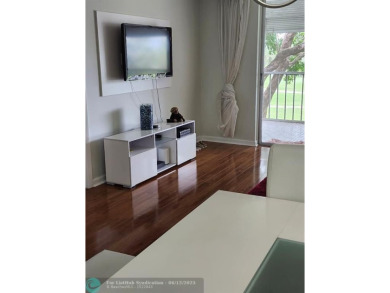 Beautiful Corner unit, nicely updated with direct golf course on  in Florida - for sale on GolfHomes.com, golf home, golf lot