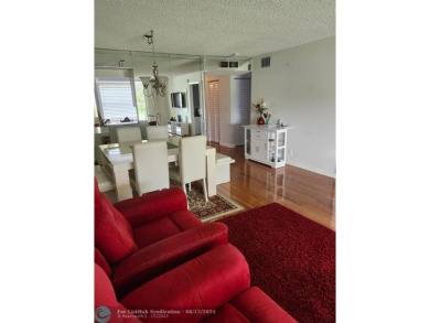 Beautiful Corner unit, nicely updated with direct golf course on  in Florida - for sale on GolfHomes.com, golf home, golf lot