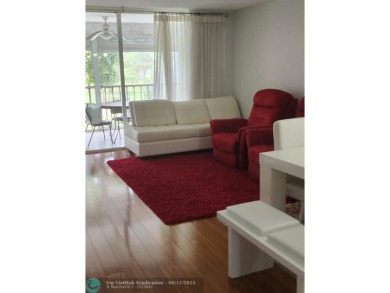 Beautiful Corner unit, nicely updated with direct golf course on  in Florida - for sale on GolfHomes.com, golf home, golf lot