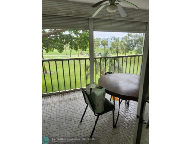 Beautiful Corner unit, nicely updated with direct golf course on  in Florida - for sale on GolfHomes.com, golf home, golf lot