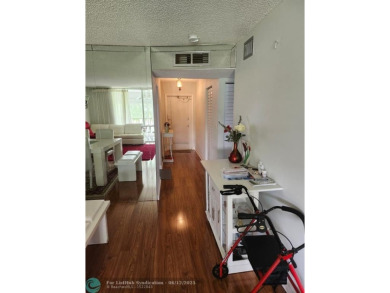 Beautiful Corner unit, nicely updated with direct golf course on  in Florida - for sale on GolfHomes.com, golf home, golf lot