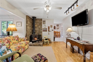 Where charm meets ideal location, this 3/2 with bonus rooms on Black Mountain Golf Course in North Carolina - for sale on GolfHomes.com, golf home, golf lot