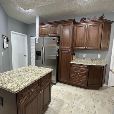 Beautiful St. Thomas model which has 2+den and 2 bath a  single on Caloosa Greens Executive Golf Course in Florida - for sale on GolfHomes.com, golf home, golf lot