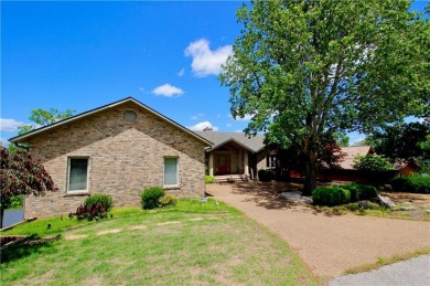 Welcome to your dream home in the heart of the Ozarks! Nestled on Holiday Island Executive Golf Course in Arkansas - for sale on GolfHomes.com, golf home, golf lot