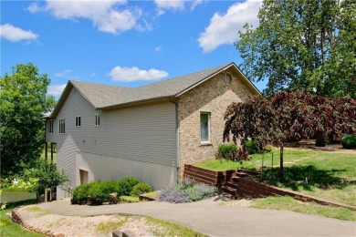 Welcome to your dream home in the heart of the Ozarks! Nestled on Holiday Island Executive Golf Course in Arkansas - for sale on GolfHomes.com, golf home, golf lot