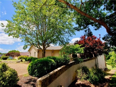 Welcome to your dream home in the heart of the Ozarks! Nestled on Holiday Island Executive Golf Course in Arkansas - for sale on GolfHomes.com, golf home, golf lot