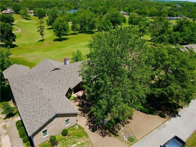 Welcome to your dream home in the heart of the Ozarks! Nestled on Holiday Island Executive Golf Course in Arkansas - for sale on GolfHomes.com, golf home, golf lot