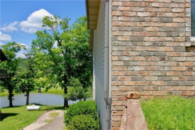 Welcome to your dream home in the heart of the Ozarks! Nestled on Holiday Island Executive Golf Course in Arkansas - for sale on GolfHomes.com, golf home, golf lot