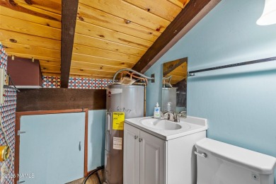 Charming cabin perfect as a secondary home or rental income on Pinewood Country Club in Arizona - for sale on GolfHomes.com, golf home, golf lot