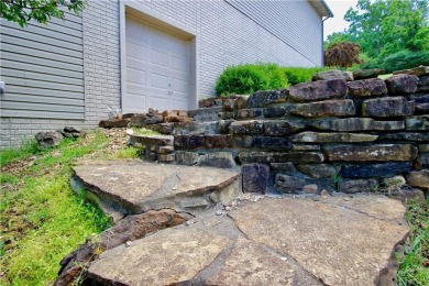 Welcome to your dream home in the heart of the Ozarks! Nestled on Holiday Island Executive Golf Course in Arkansas - for sale on GolfHomes.com, golf home, golf lot