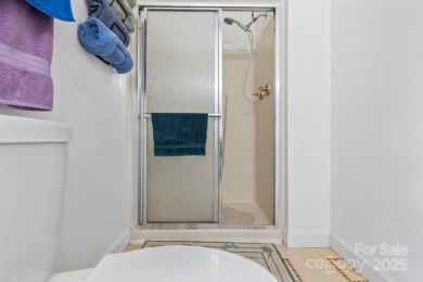 Where charm meets ideal location, this 3/2 with bonus rooms on Black Mountain Golf Course in North Carolina - for sale on GolfHomes.com, golf home, golf lot