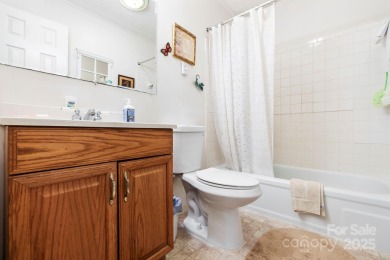 Where charm meets ideal location, this 3/2 with bonus rooms on Black Mountain Golf Course in North Carolina - for sale on GolfHomes.com, golf home, golf lot