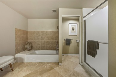 Enjoy carefree luxury living at Rancho Mirage's only high-rise on Desert Island Golf and Country Club in California - for sale on GolfHomes.com, golf home, golf lot