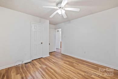 Where charm meets ideal location, this 3/2 with bonus rooms on Black Mountain Golf Course in North Carolina - for sale on GolfHomes.com, golf home, golf lot