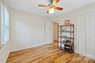 Where charm meets ideal location, this 3/2 with bonus rooms on Black Mountain Golf Course in North Carolina - for sale on GolfHomes.com, golf home, golf lot