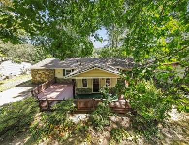 Where charm meets ideal location, this 3/2 with bonus rooms on Black Mountain Golf Course in North Carolina - for sale on GolfHomes.com, golf home, golf lot