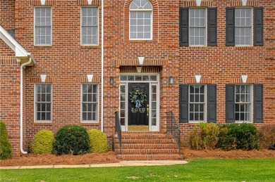 Don't miss this lovely custom brick 2-story home with 5 bedrooms on Salem Glen Country Club in North Carolina - for sale on GolfHomes.com, golf home, golf lot