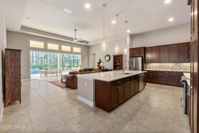 Welcome to this stunning estate home where this luxurious abode on Plantation Bay Golf and Country Club in Florida - for sale on GolfHomes.com, golf home, golf lot