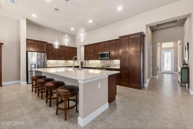 Welcome to this stunning estate home where this luxurious abode on Plantation Bay Golf and Country Club in Florida - for sale on GolfHomes.com, golf home, golf lot